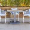 accra outdoor dining table + 4 kampala chairs